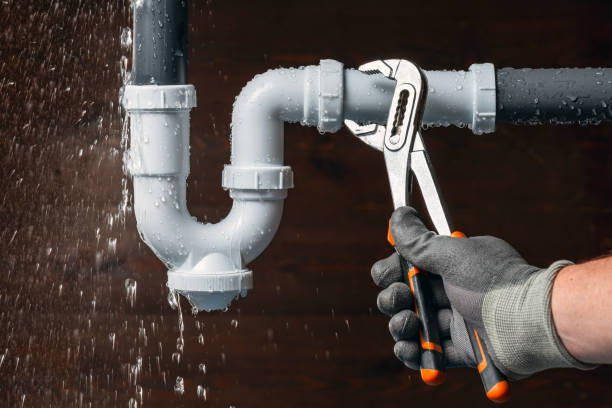 Professional Drain Cleaning technician working in Rexburg, ID